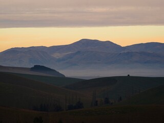 Wall Mural - Panorama view of mountain range with low clouds along Highway 79 between Fairline and Geraldine Canterbury New Zealand