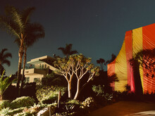 A Home At Night In San Diego Is Tented As It Is Fumigated Inside To Treat For A Termite Infestation.