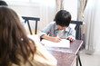 © Wannachai - Cute primary school students are concentrating and enjoying studying.  Education, primary school, learning and people concept..