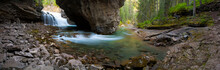 Rushing Water Carves A Path Through The Limestone Of Johnston Canyon In Banff National Park, Alberta, Canada.