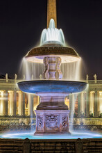 Fountain With Cathedral At St Peter Square, Rome, Italy