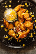 © Addie Mannan Photography/Stocksy - Coconut shrimp and sauce