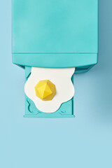 90s computer with paper fried egg in CD drive.