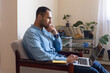© Demetr White/Stocksy - conceived man behind a laptop