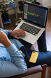 © Demetr White/Stocksy - laptop on man's knee