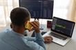 © Demetr White/Stocksy - trader talking on the phone