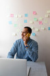 © Demetr White/Stocksy - man waiting for a call