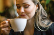 © Irina Efremova/Stocksy - Woman enjoying a cup of coffee