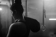 © Albert Law - Young Asian female training in gym with weights at night