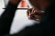 © Studio Firma/Stocksy - Woman Taking Notes