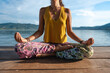 © Luis Herrera/Stocksy - yoga outdoors meditation