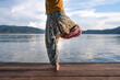 © Luis Herrera/Stocksy - yoga outdoors