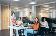 © Pedro Merino/Stocksy - Happy Multiethnic Teamwork In A Coworking Space