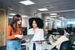 © Pedro Merino/Stocksy - Business women working in a coworking space.