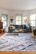 © Raymond Forbes LLC/Stocksy - Contemporary living room in home with artwork