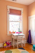 © Raymond Forbes LLC/Stocksy - Desk in Bedroom of child in home interior