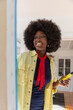 © Raymond Forbes LLC/Stocksy - African American Lifestyle Girl artist Painting portrait