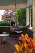 © Raymond Forbes LLC/Stocksy - Black  Lifestyle Girl relaxing at home with tablet computer