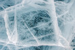 © Anna Sorokina/Stocksy - Ice pattern of the frozen lake