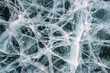 © Anna Sorokina/Stocksy - Ice pattern of the frozen lake