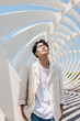 © Heng Yu/Stocksy - Portrait of  fashion Asian man posing