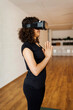 © Valentina Barreto/Stocksy - Modern woman during virtual reality yoga class