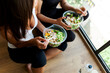 © Valentina Barreto/Stocksy - Buddies eating lunch after yoga