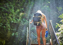 Rear View Of Young Woman Hiking In Costa Rica