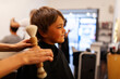 © Valentina Barreto/Stocksy - Jolly boy at hairdresser