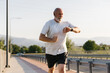 © STUDIO TAURUS/Stocksy - Man Running On The Bridge