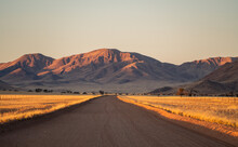 Dirt Road Between Hills On Namib Desert In Namibia