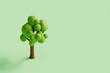 © Davide Illini/Stocksy - 3d tree on a green background