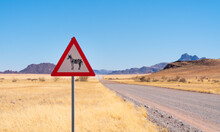 Zebra Crossing Danger Sign In A Gravel Road, Namibia, Africa