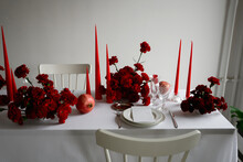 New Year Table Setting With Red Dianthus