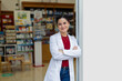 © Javier Pardina/Stocksy - Female Pharmacist Smiling