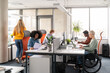© Hernandez & Sorokina/Stocksy - People Working At Office