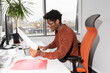 © Hernandez & Sorokina/Stocksy - Man Working With Documents In Office