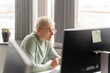 © Hernandez & Sorokina/Stocksy - Woman Working With PC At Her Desk