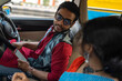 © Dream Lover/Stocksy - Indian couple talking and making interaction inside a car