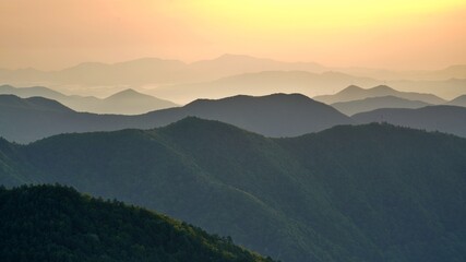 Wall Mural - View of the surrounding mountains from the Hadong gliding field in South Korea