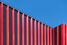 Red Abstract Detail Of Modern Industrial Building Facade