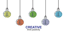 Creative Mind Cradle Pendulum With Hanging Light Bulbs As Idea And Creativity Concept. Colorful Bulb Among Plain Grey Ones.