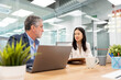 © Santi Nuñez/Stocksy - Businesspeople Working in Modern Office