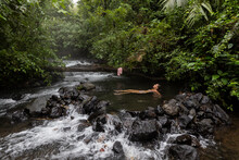 Costa Rica Waterfall Landscape Woman Bathes In River Hot Springs 