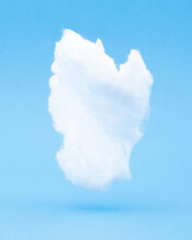 White Cotton Cloud Float In A Blue Paper Sky