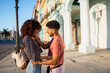 © Daniel Gonzalez/Stocksy - Cuban couple during date on street