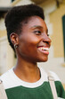 © Lightsy/Stocksy - African-American woman laughing