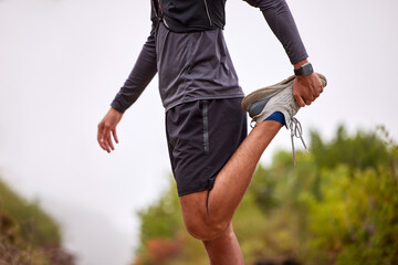 Canvas Print - Exercise, balance and man stretching legs on nature trail for running, marathon training and cardio workout. Sports, healthy body and torso of male athlete warm up for wellness, energy and fitness