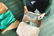 © Pixel Stories/Stocksy - Middle-aged adult woman opening shoes delivery box