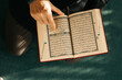 © Melika Tursic Musinovic/Stocksy - Top view of Quran